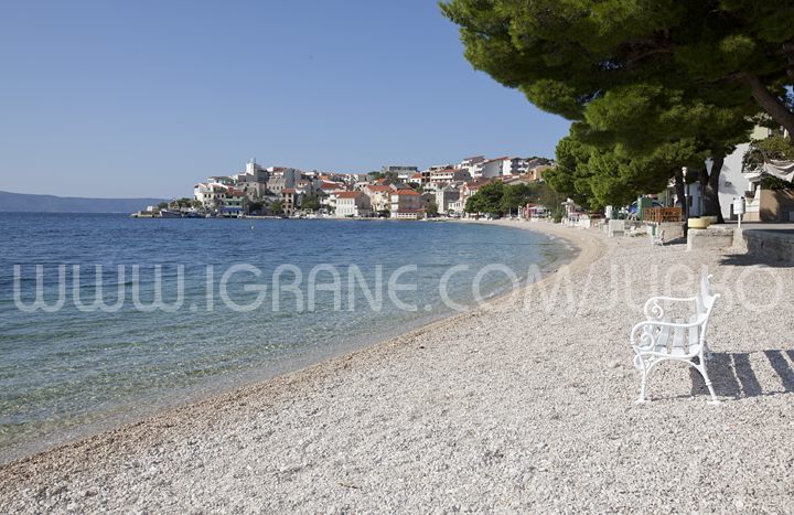 natural pebble beach in Igrane, center