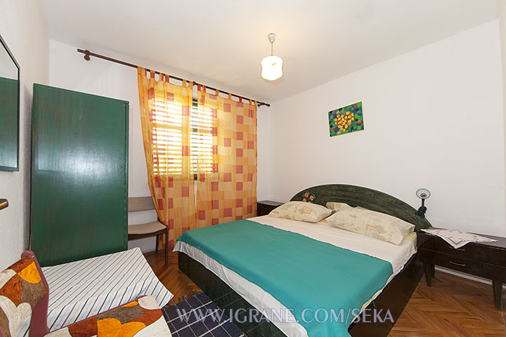 apartment Seka, Igrane - first bedroom